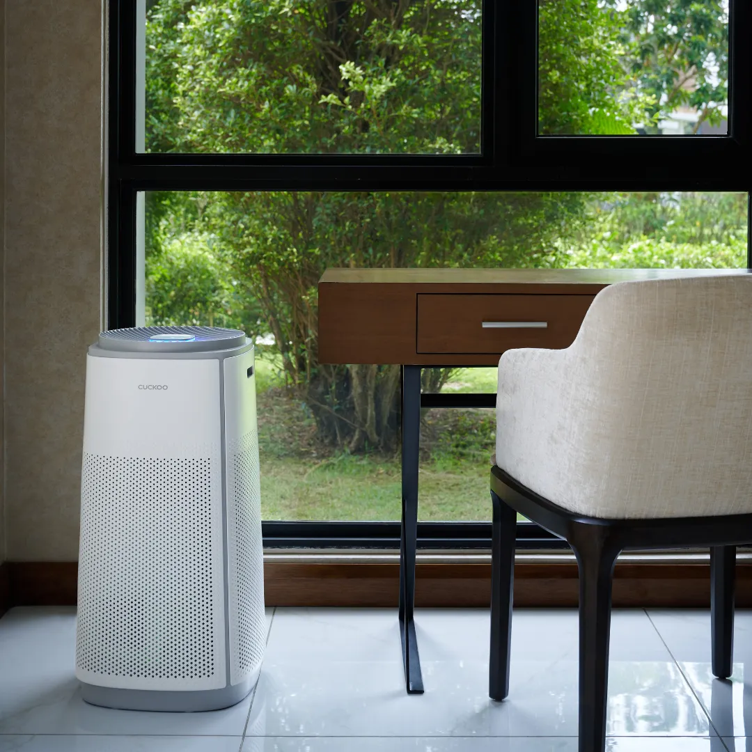 CUCKOO K Model beside a desk