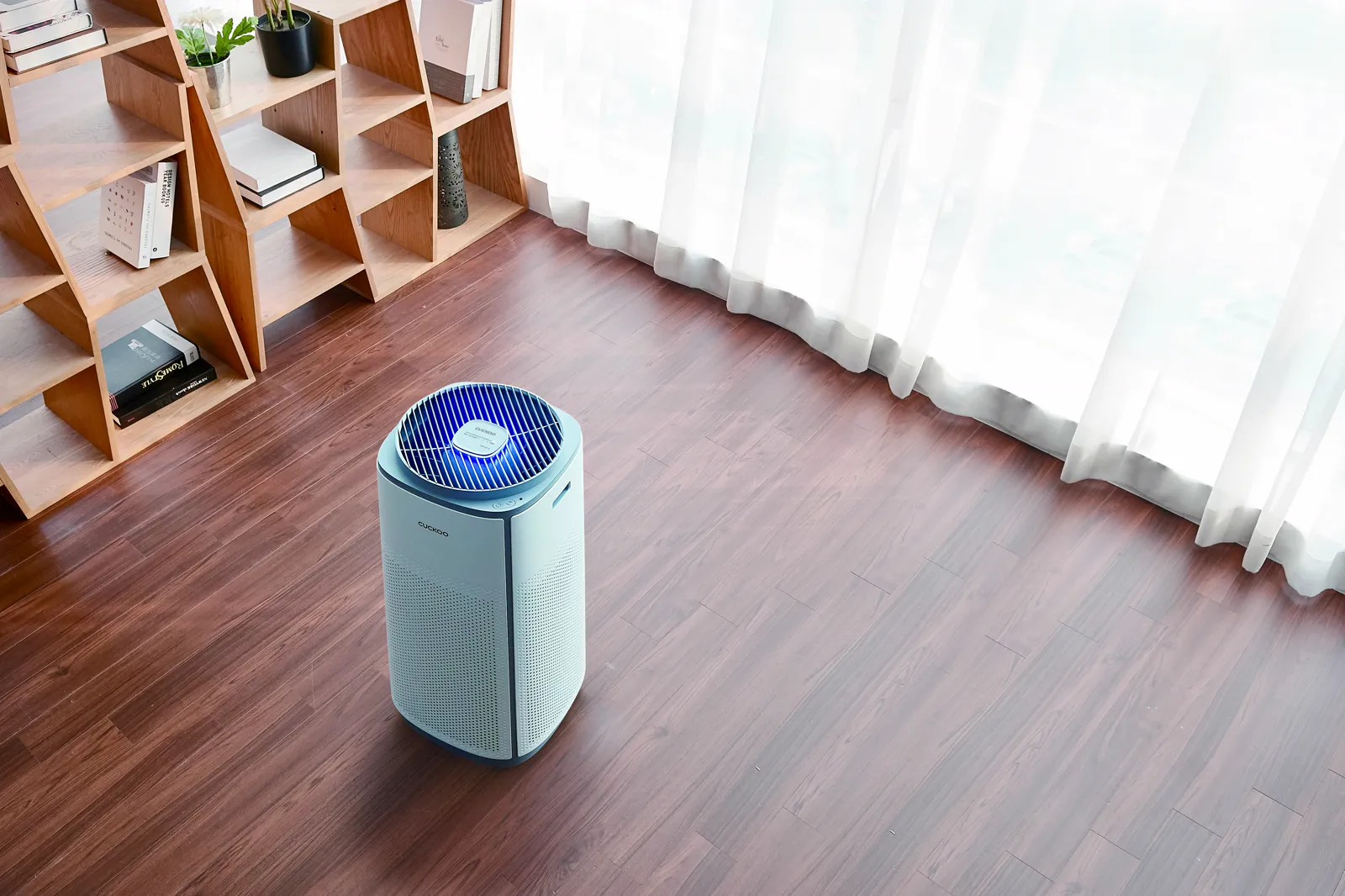 CUCKOO K Model on a wooden floor