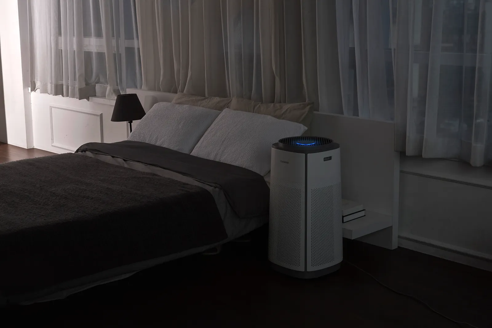 CUCKOO K Model in a bedroom at night